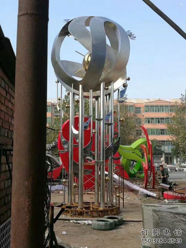 地球儀雕塑定制，小區(qū)雕塑，不銹鋼手托地球儀雕塑廠家