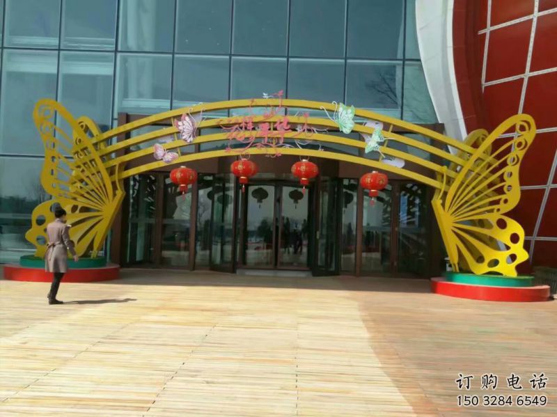 九龍坡蝴蝶拱門雕塑，鏤空烤漆效果，不銹鋼小區(qū)標(biāo)識雕塑